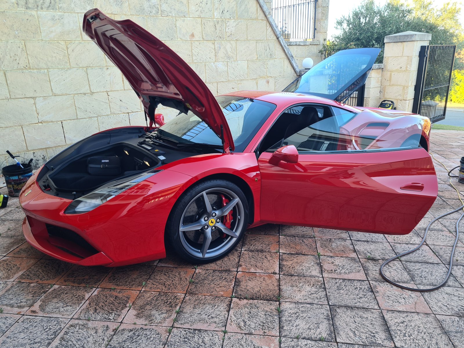 Exterior maintenance detail result showing clean paint and tyres on a Perth car
